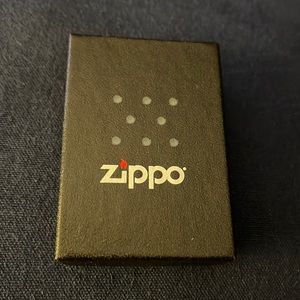 Brand new, never used, street chrome zippo lighter in original box.